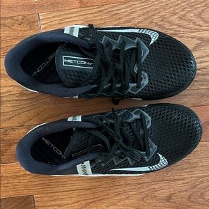 Nike Metcon Black and White Athletic Shoes
Women’s 9 - 9.5 / Men’s 8